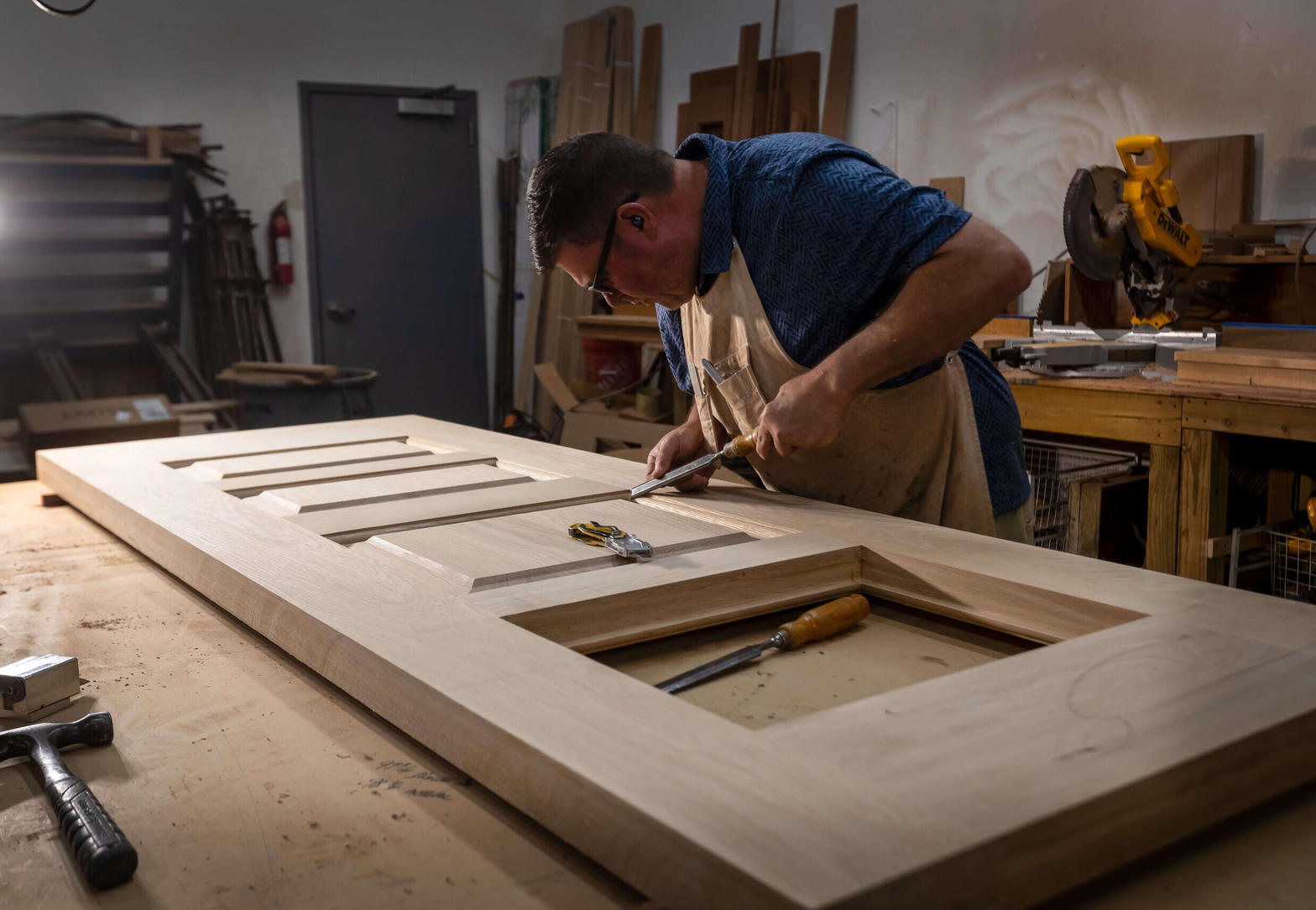 Craftsman building a custom wood door
